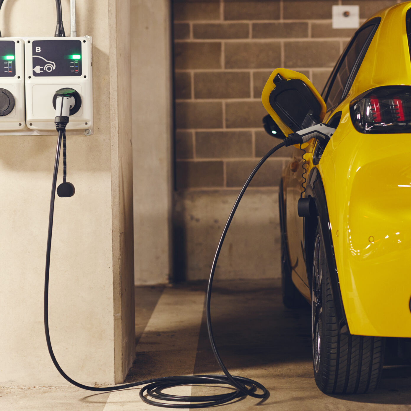 Electric car charging home garage on rapid charger